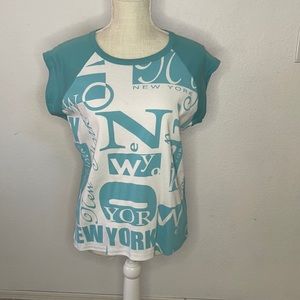 Woman’s Overwear blue and white top. Size XL